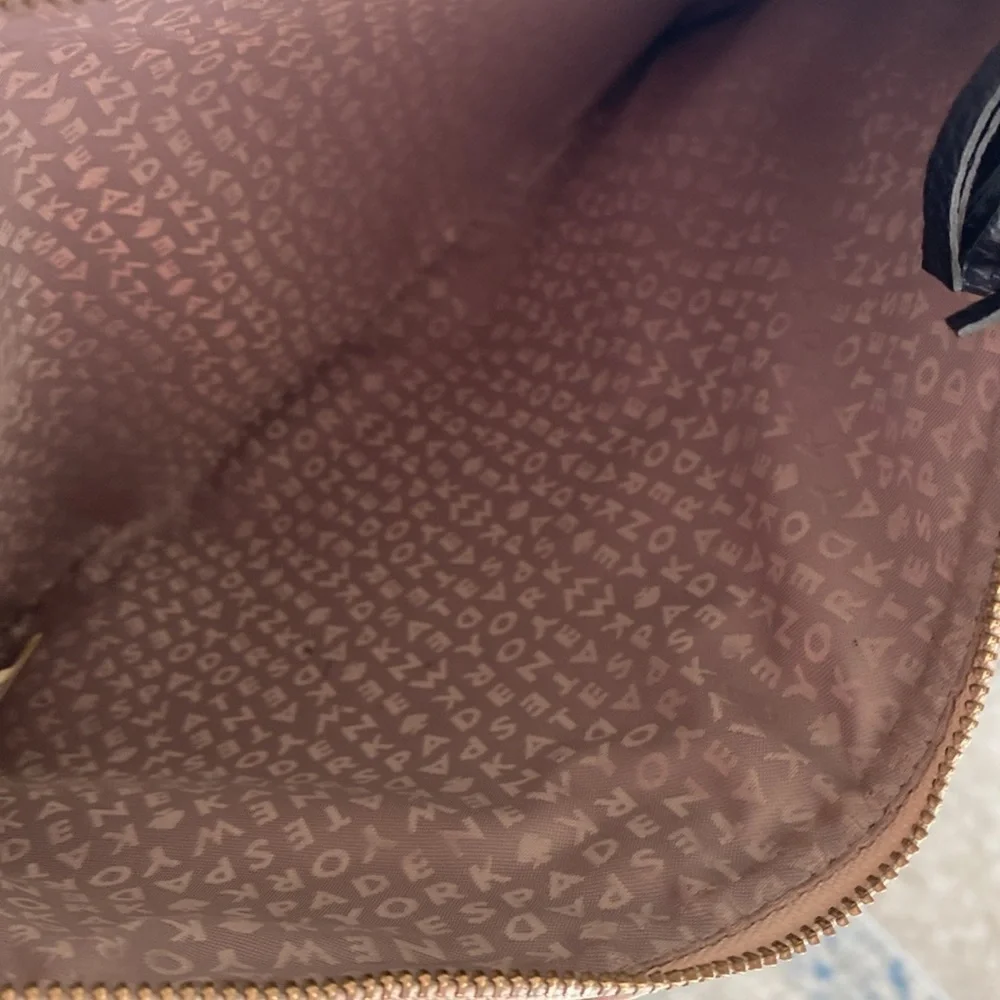 Kate Spade tan wristlet